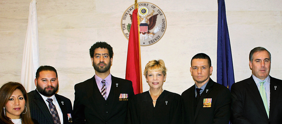 Centered above: New York Supreme Court Justice Honorable Judge Hirsch, presiding over the Queens County Veterans Treatment Courts.