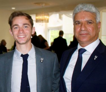 From left is Lou Costa, digital media manager for Veterans Rebuilding Life, standing alongside Ameer Aljubouri.