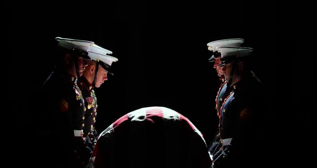 Members of the Marine Corps Honor Guard, a specialized branch of the military dedicated to providing final burial honors for fallen service members. Members of the Marine Corps Honor Guard, a specialized branch of the military dedicated to providing final burial honors for fallen service members.