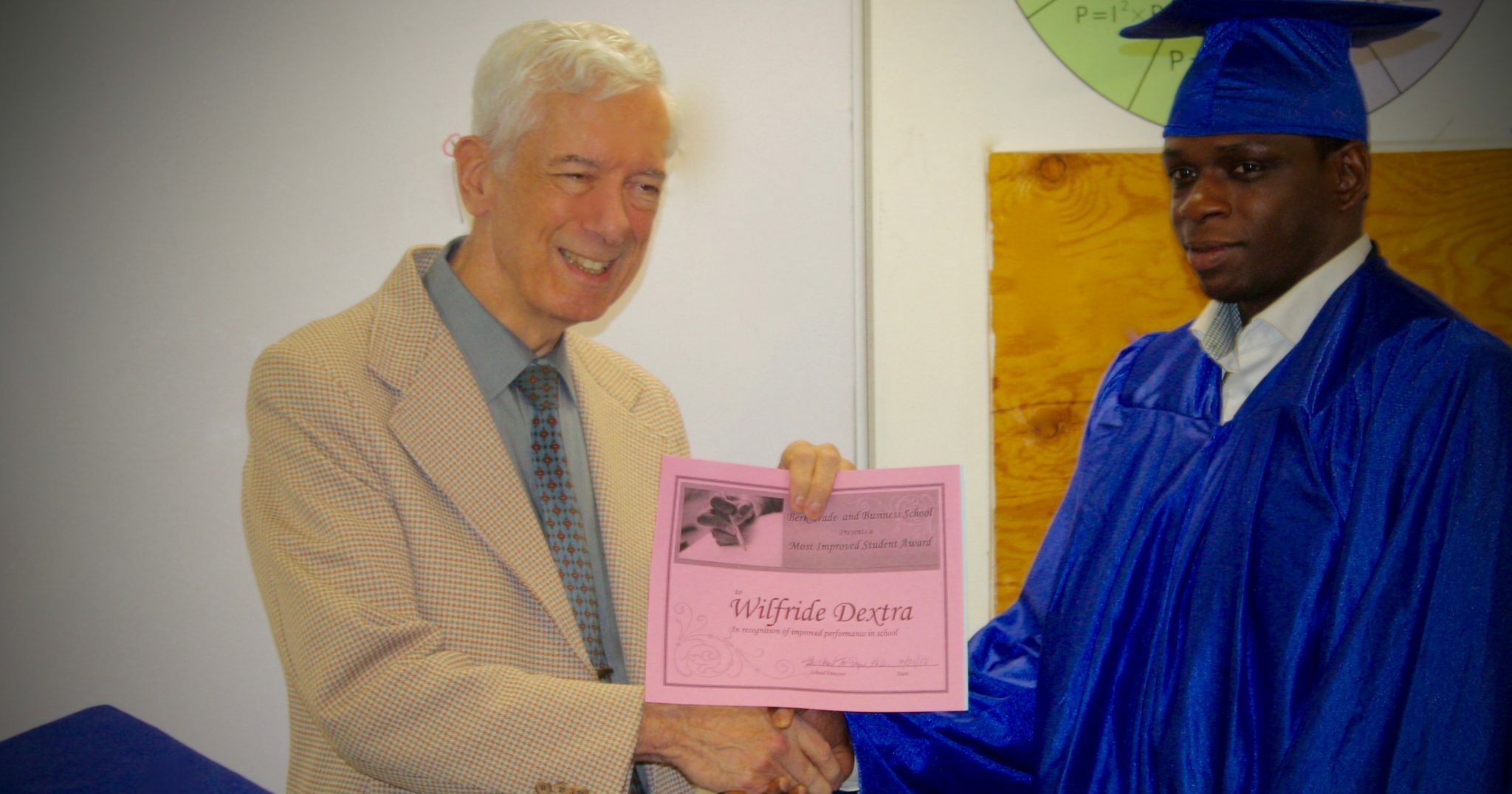 Seen above is Wilfride Dextra, during his graduation ceremony from the professional trade school in Queens, NY. Seen above is Wilfride Dextra, during his graduation ceremony from the professional trade school in Queens, NY.