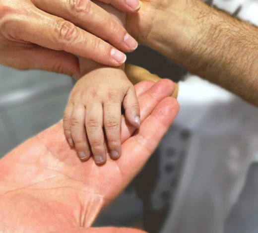 The fragile hand of a child patient's life. vrl-child-mission
