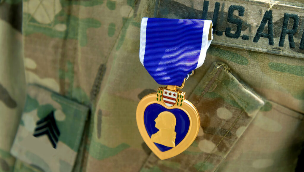 Army Sgt. Earl Frazier received the Purple Heart after sustaining serious injuries in combat during the Iraq War.