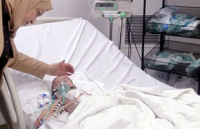 Baby Farah and her mother, in the medical facilities intensive care unit.