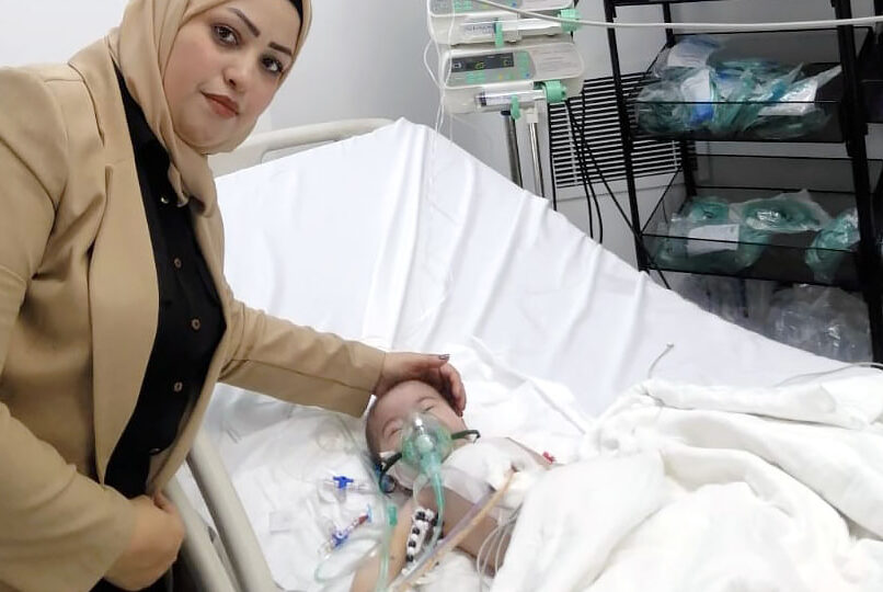 VRL, Veterans Rebuilding Life, nonprofit organization Baby Farah with her mother, at the intensive care unit, pre-surgery.