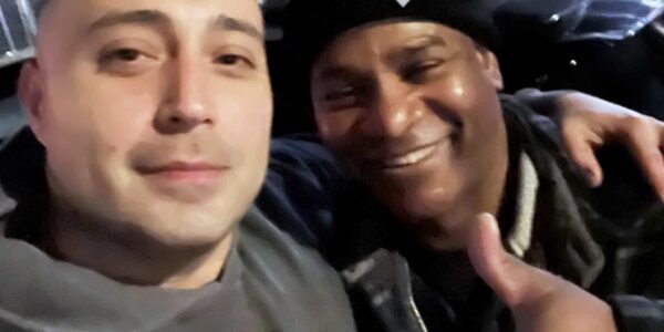From left: Veterans Rebuilding Life member Chris Zamora, with Davis when delivering VRL's care package.