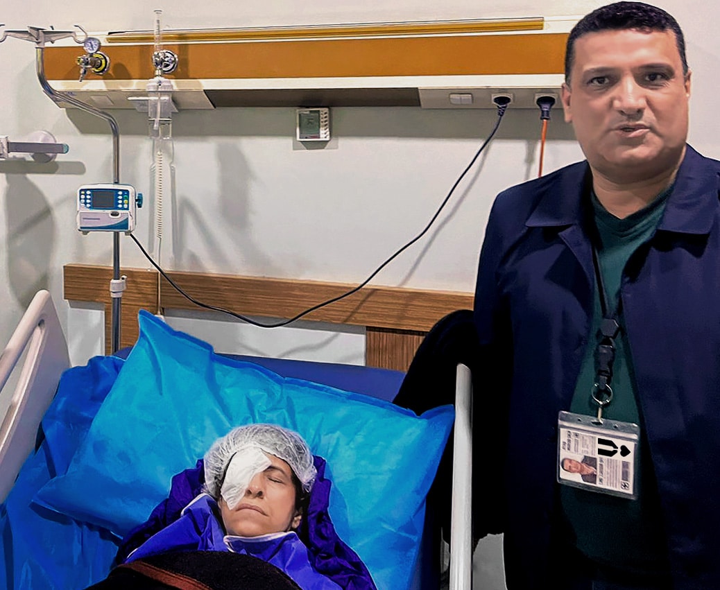 Operation Samera's patient seen resting, post surgery, alongside Ayad of Iraqi Institute for Development, a nonprofit partner. Medical mission patient resting, post surgery alongside Veterans Rebuilding Life member.