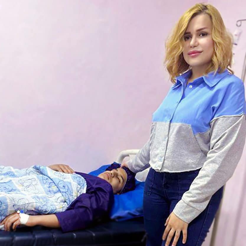 Recovering child medical patient with his mother.