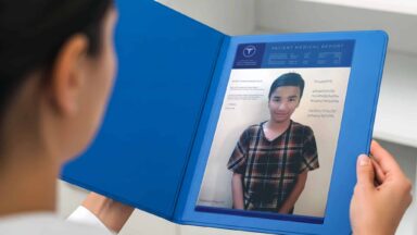 Doctors review Othman's medical report, prior to the child patient's open heart surgery.