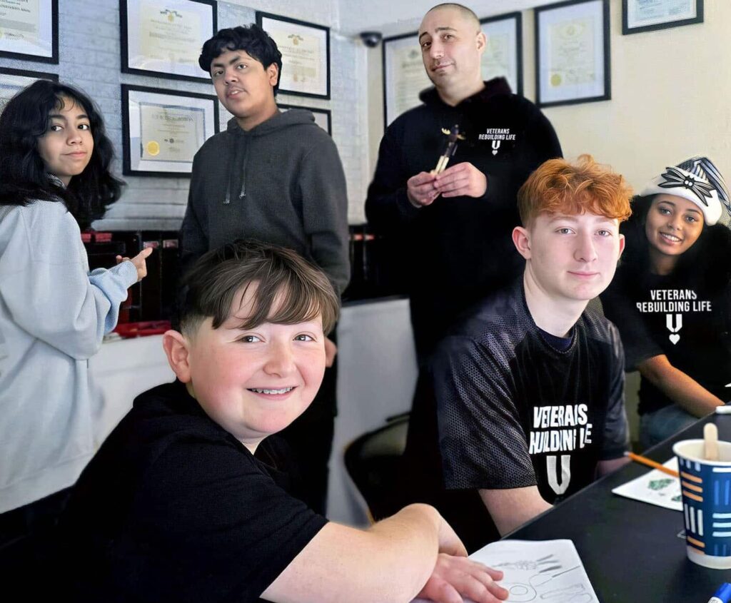 Veterans and community volunteers attending at the Creative Arts Workshop, hosted by: Veterans Rebuilding Life, and sponsored by the Joseph P. Dwyer program.