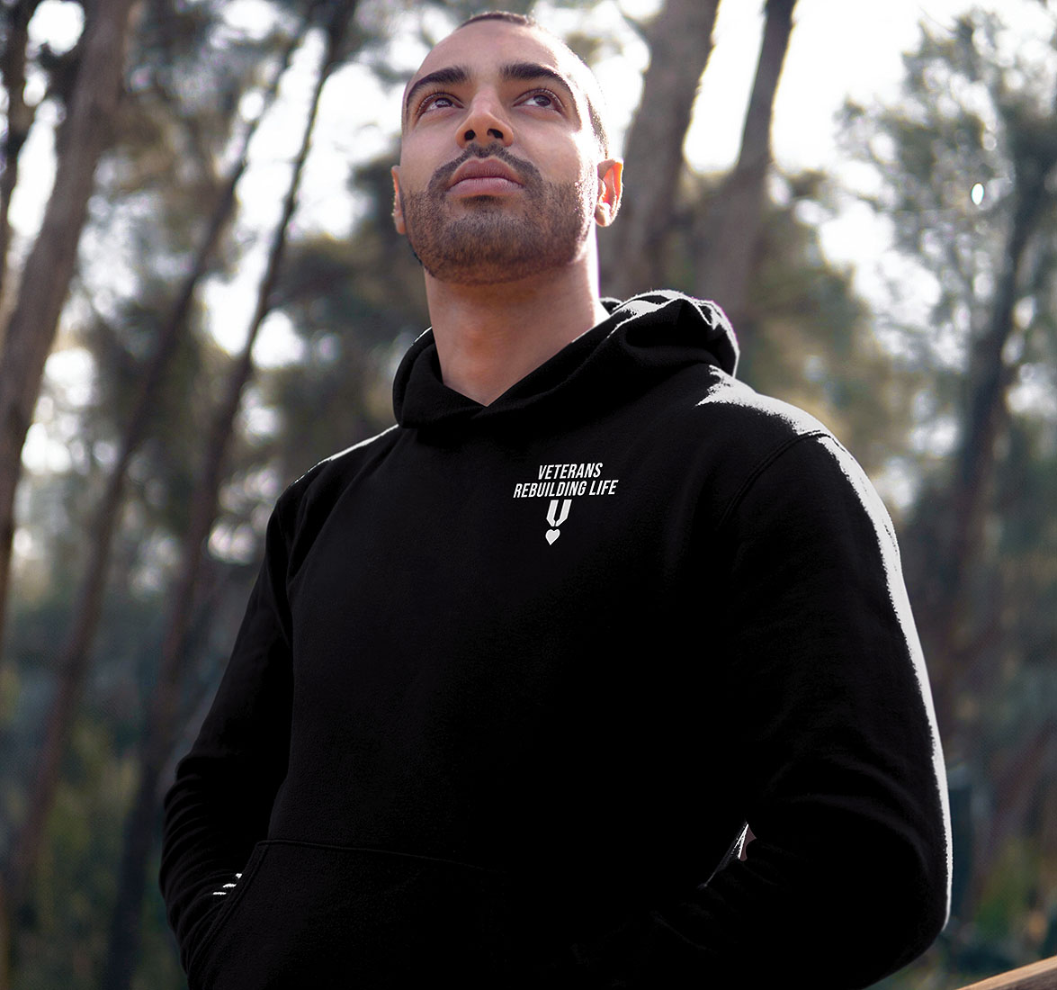 Unisex hoodie's double-stitched design on the front left chest.