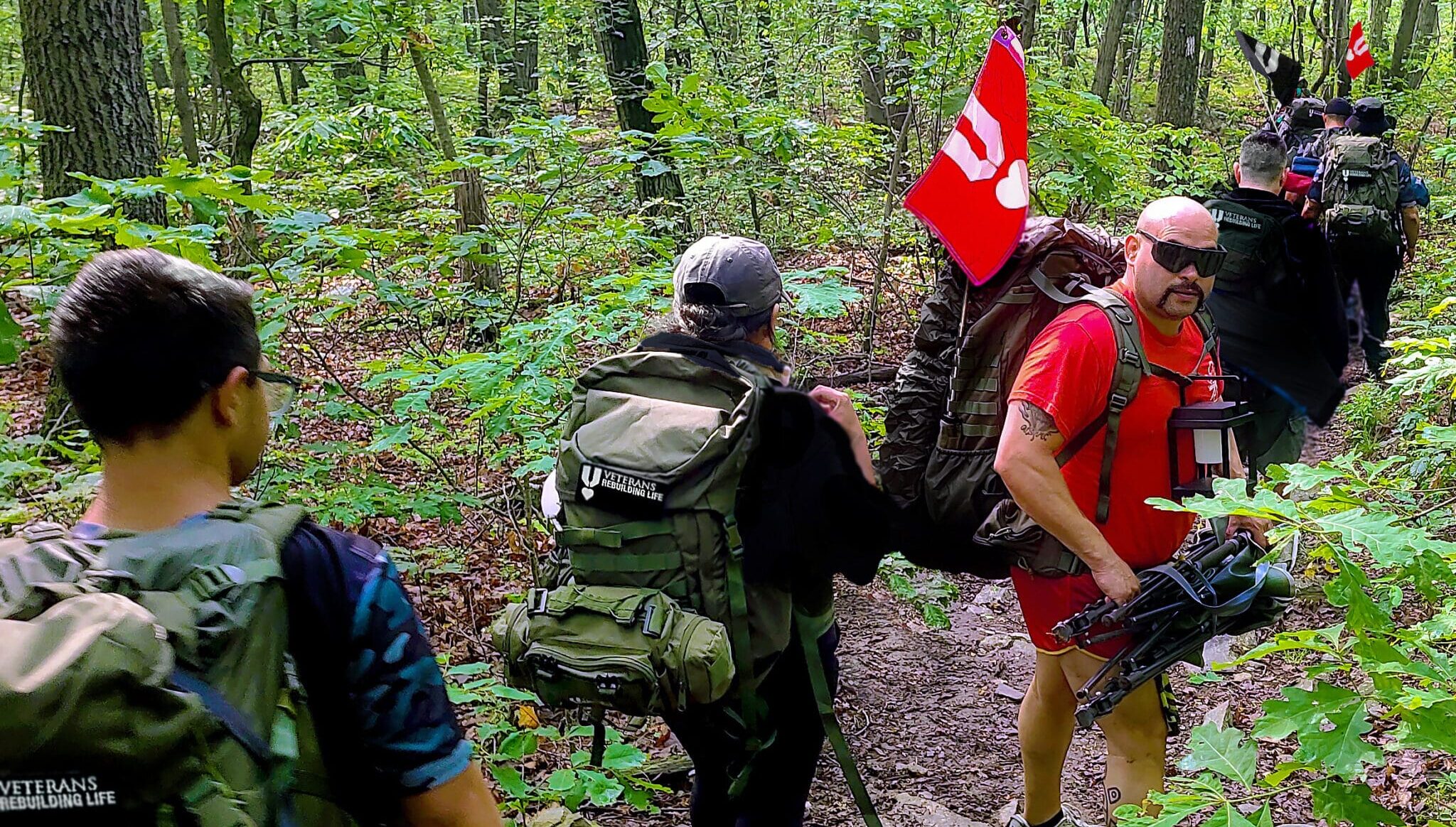 Guidon Bearer: Kevin Vargas Colon, Marine combat veteran of the Global War on Terror, hiking the Appalachian Trail in Warwick, NY, an elevation gain of 3,763 feet.