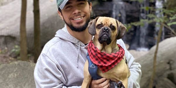 Army Veteran: Javier Gonzalez, seen here with his best friend in Central Park, NY.